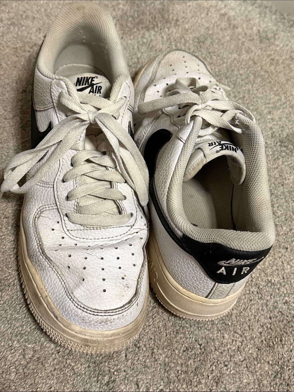 Nike Kids White Sneakers with Black Swoosh